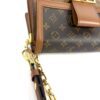 Angled view of the chain and gold clasp