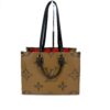 Caramel side of the tote with the handles standing