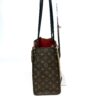 Narrow side view showing the depth of the tote