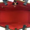 Interior red lining with the gold clip fastening