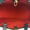 Interior red lining with the gold hook clip