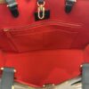 Interior red lining with the zip pocket