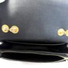 Interior with gold hardware and the zip pocket