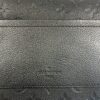 Back panel with the embossed Louis Vuitton logo
