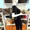 Mannequin holding the bag with the chain strap