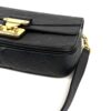 Angled view with the leather strap attached