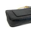 Side profile showing the flap and depth