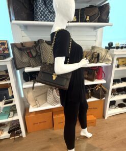 Victoire carried by a mannequin in the boutique
