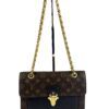 Louis Vuitton Victoire shoulder bag in Monogram canvas and black leather with gold S-lock