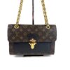 Front of the bag with the chain extended above