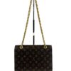 Bag with the chain strap hanging full length