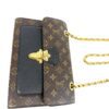 Bag laid flat with the chain beside it