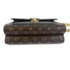 Top of the bag showing the flap and gold lock
