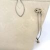 Close view of the side lacing and embossed monogram