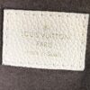 Heat stamp reading LOUIS VUITTON PARIS made in Spain