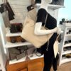 Neverfull MM carried by a mannequin in the boutique