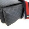 Front pocket with the flap raised above it