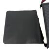 Flap opened forward showing the plain black underside