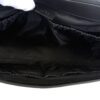 Gloved hand holding open the black nylon interior