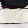 White padded changing mat that comes with the bag