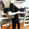 Mannequin holding the bag on the shoulder