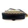 Base of the bag in smooth black leather