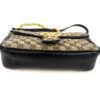 Side of the bag with the chain draped