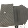 Flap opened flat from the front showing the snap placement
