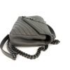 Top down view of the chevron quilted flap and top handle