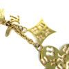 Close up of the enamel monogram flower and star charms
