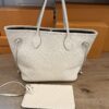 Tote shown with the matching pouch in front