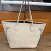 Front of the tote standing with the handles upright