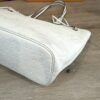 Base corner showing the embossed leather and seam