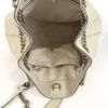 Overhead view into the open bag with the tassel to one side
