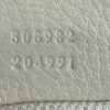 Serial 308982 204991 embossed inside the bag