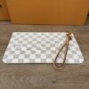 Back of the pochette with the strap extended