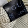 Interior Gucci tag showing the reference number