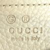 GUCCI made in Italy embossed into the cream leather