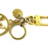 Full charm laid out with the clasp, rings and LV disc
