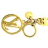 Close up of the LV circle and the round Louis Vuitton tag