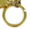 Louis Vuitton lettering engraved around the key ring