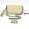 Soho crossbody shown with its Gucci dust bag and care card