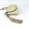 Top of the bag showing the flap closure and hanging tassel