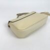 Base and side of the Soho bag in cream pebbled leather