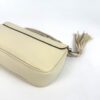 Base of the bag at an angle with the tassel to the side