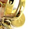 Clasp and chain links held between the fingers