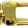 Close up of the gold swivel clasp and its stamped bar