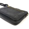 Back zip pocket with the gold pull