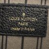 Heat stamp reading LOUIS VUITTON PARIS made in France