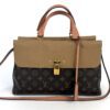 Louis Vuitton Venus satchel in Monogram canvas with peach beige leather and a gold padlock, shown with its strap attached